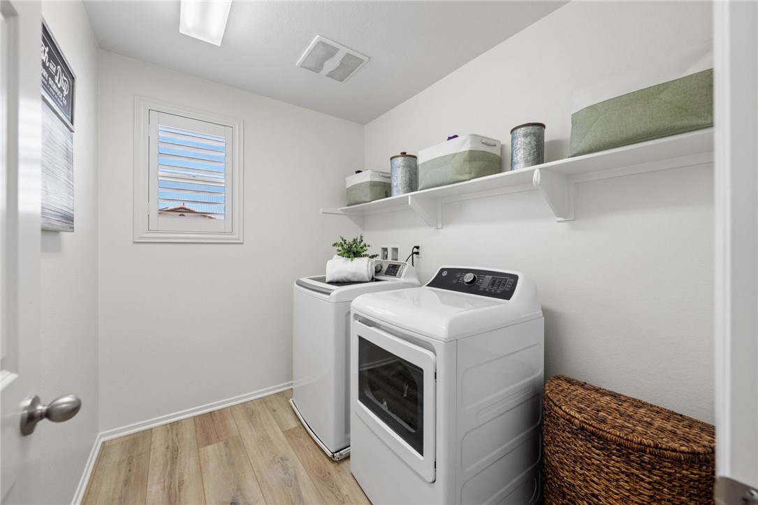 25432 Lone Acres Road Menifee, CA 92584 - Photo 24 of 65 Upper level laundry room