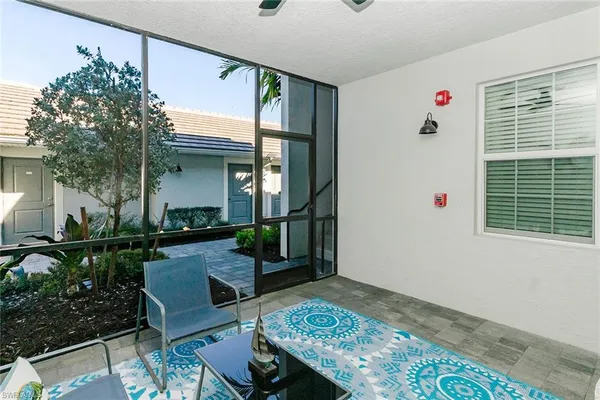 a front view of house with yard outdoor seating and barbeque oven