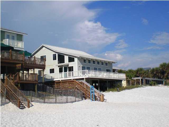 665 Eastern Lake Road Santa Rosa Beach, FL 32459 - Photo 1 of 11 a view of a house with sitting area