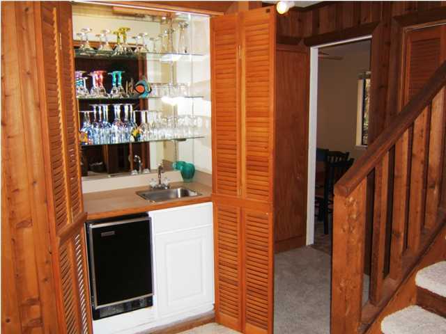 665 Eastern Lake Road Santa Rosa Beach, FL 32459 - Photo 6 of 11 a kitchen view with a sink and cabinets