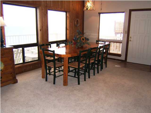665 Eastern Lake Road Santa Rosa Beach, FL 32459 - Photo 7 of 11 a view of a dining room with furniture and window