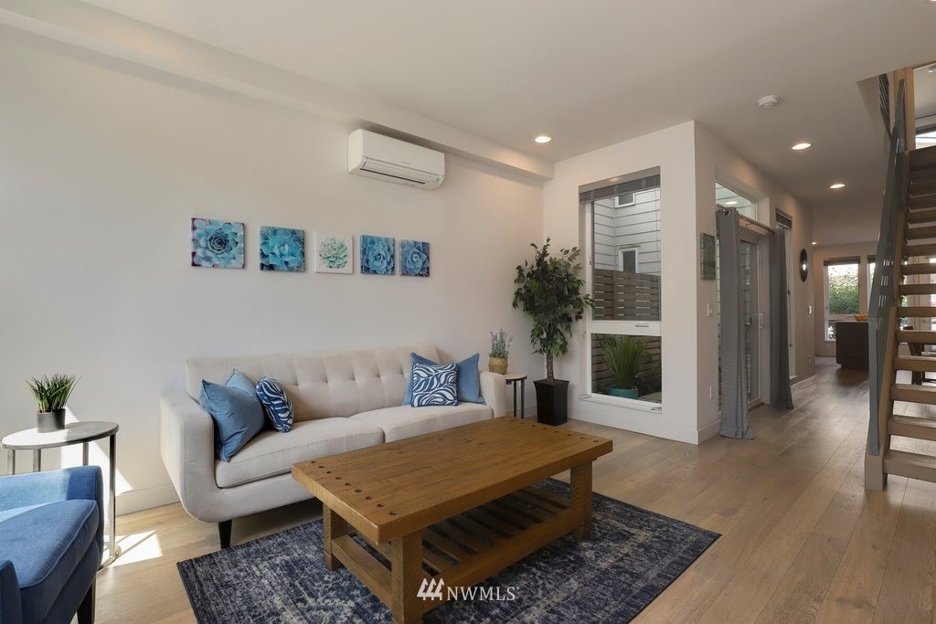 1730 Northwest 60th Street Seattle, WA 98107 - Photo 4 of 25 a living room with furniture and a rug