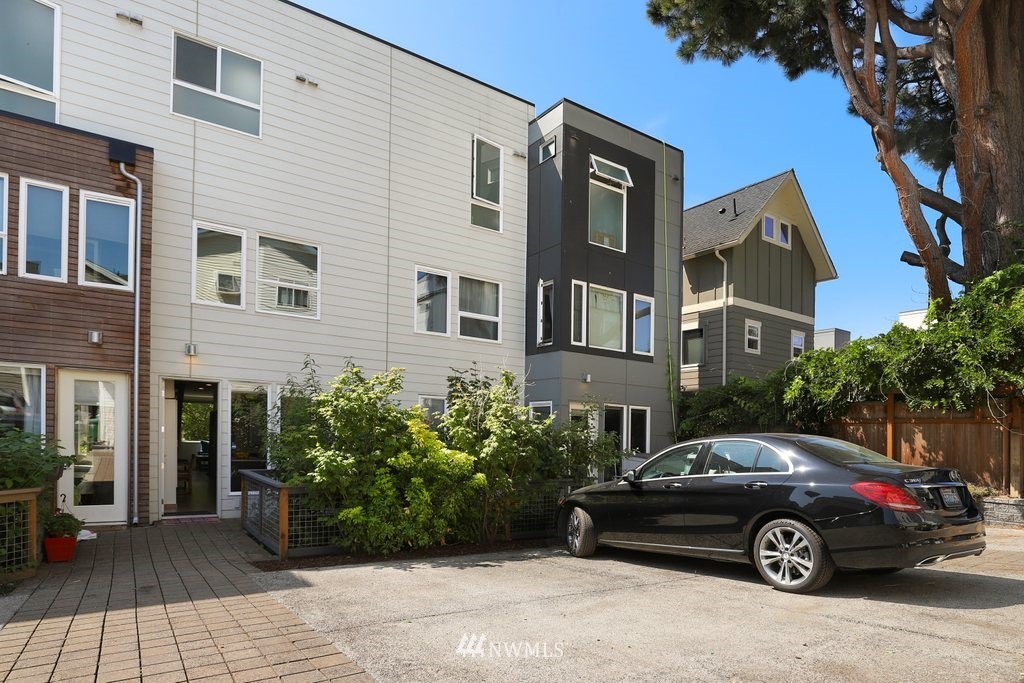 1730 Northwest 60th Street Seattle, WA 98107 - Photo 10 of 25 a view of a car parked in front of a house