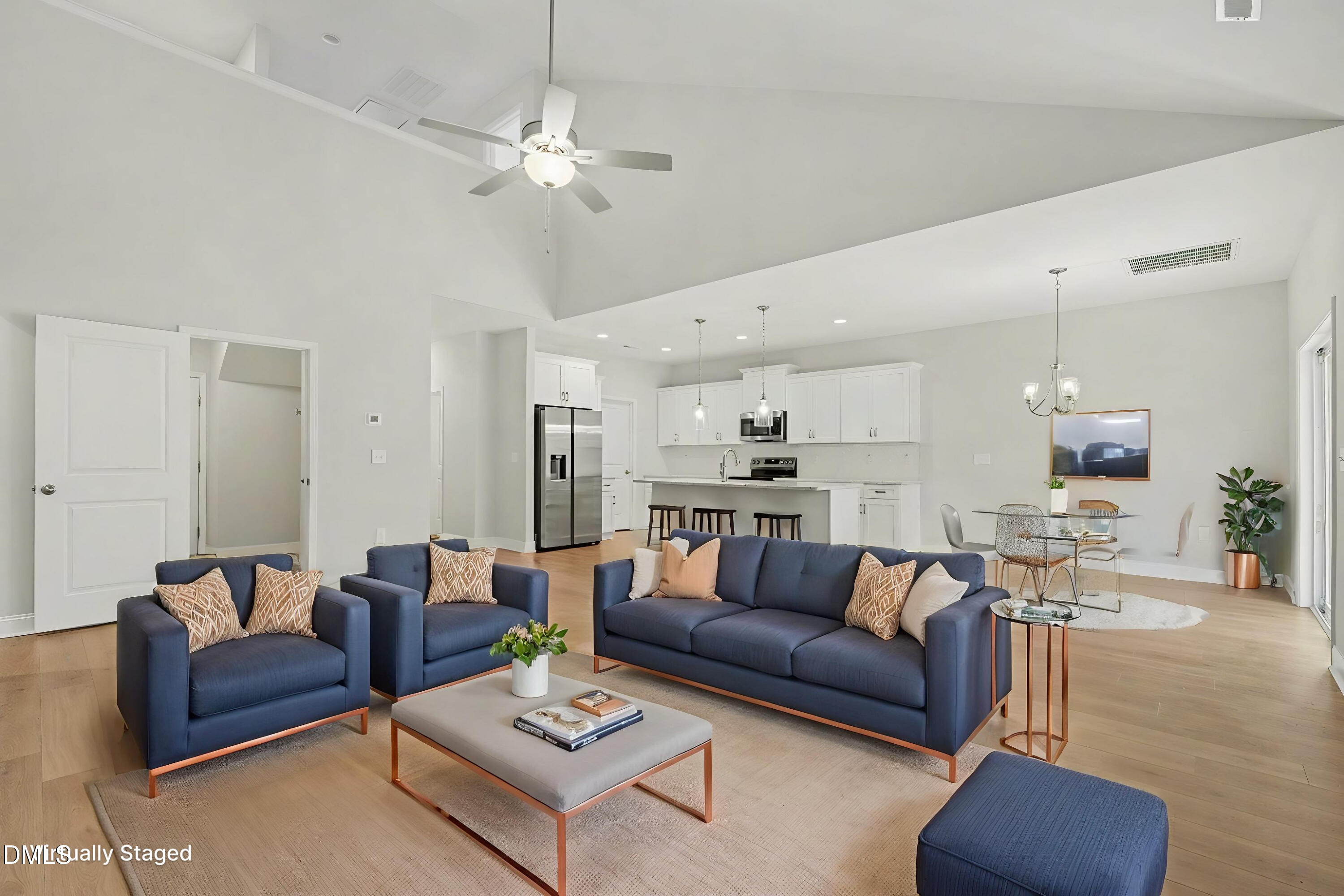 2815 Lemuel Black Road Spring Lake, NC 28390 - Photo 7 of 37 a living room with furniture kitchen view and a table