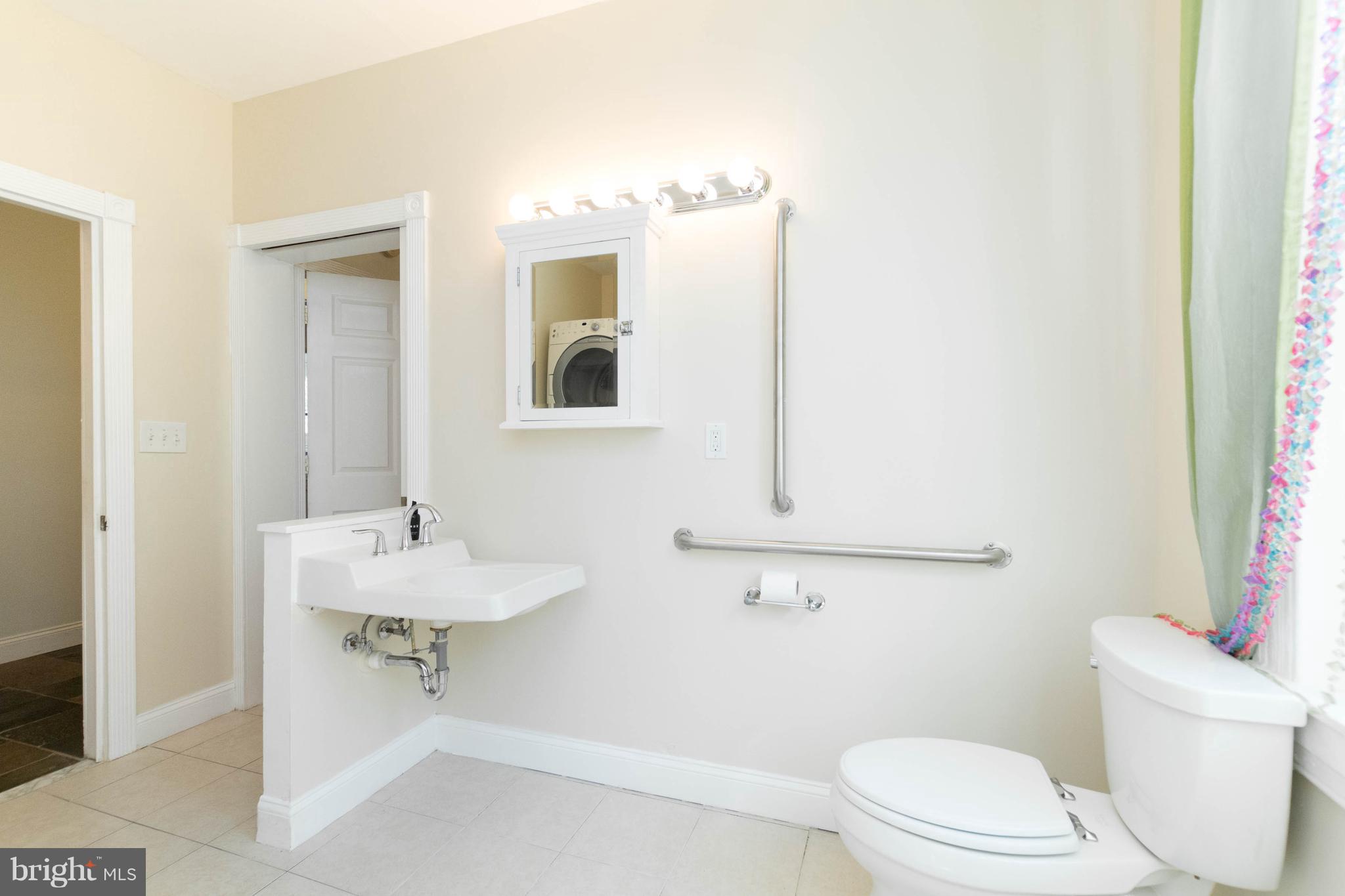 5318 Catalpha Road Baltimore, MD 21214 - Photo 11 of 27 Main Level Bath Has Room to Spare