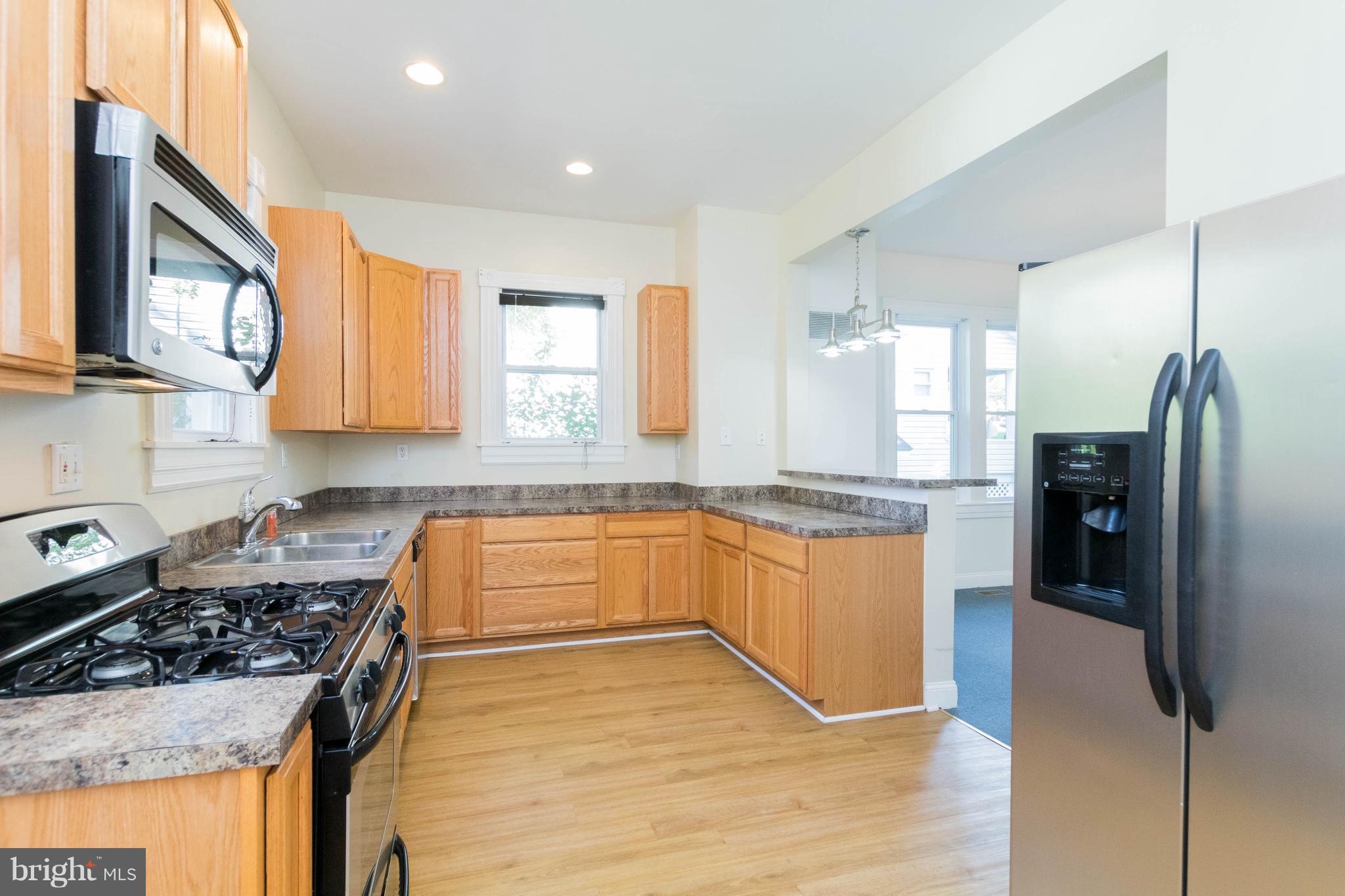 5318 Catalpha Road Baltimore, MD 21214 - Photo 5 of 27 Fully Renovated Kitchen w SS Appliances