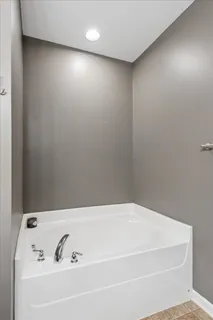 a bathroom with a bathtub