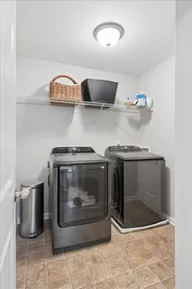 a stove top oven sitting inside of a kitchen