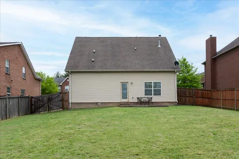 a house view with a garden space