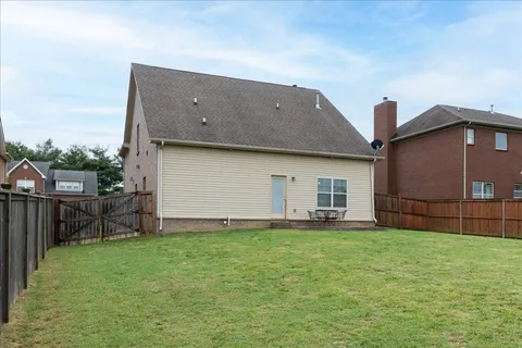 a house view with a garden space