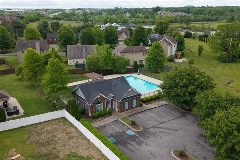 an aerial view of a house with a garden