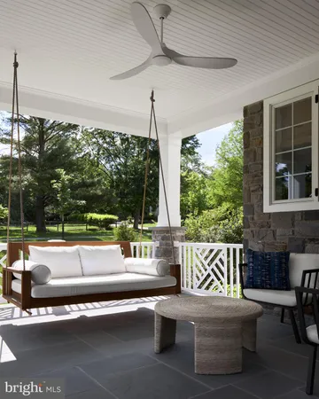 a outdoor living space with furniture and garden view