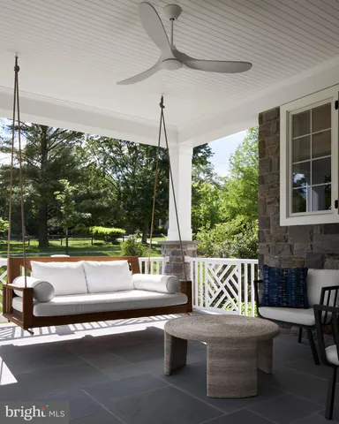 a outdoor living space with furniture and garden view