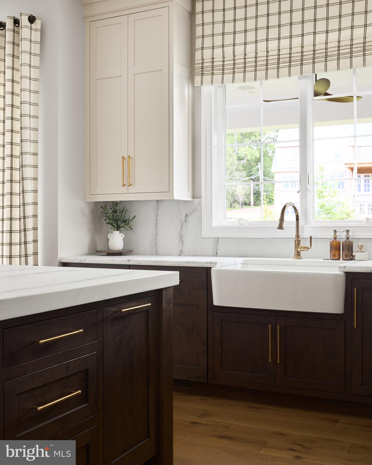 1052 Eagle Road Wayne, PA 19087 - Photo 7 of 18 a kitchen with a sink cabinets and a large window