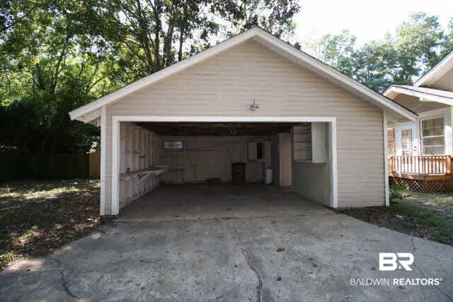 1557 Church Street Mobile, AL 36604 - Photo 20 of 24 Carport that also has a half bath inside