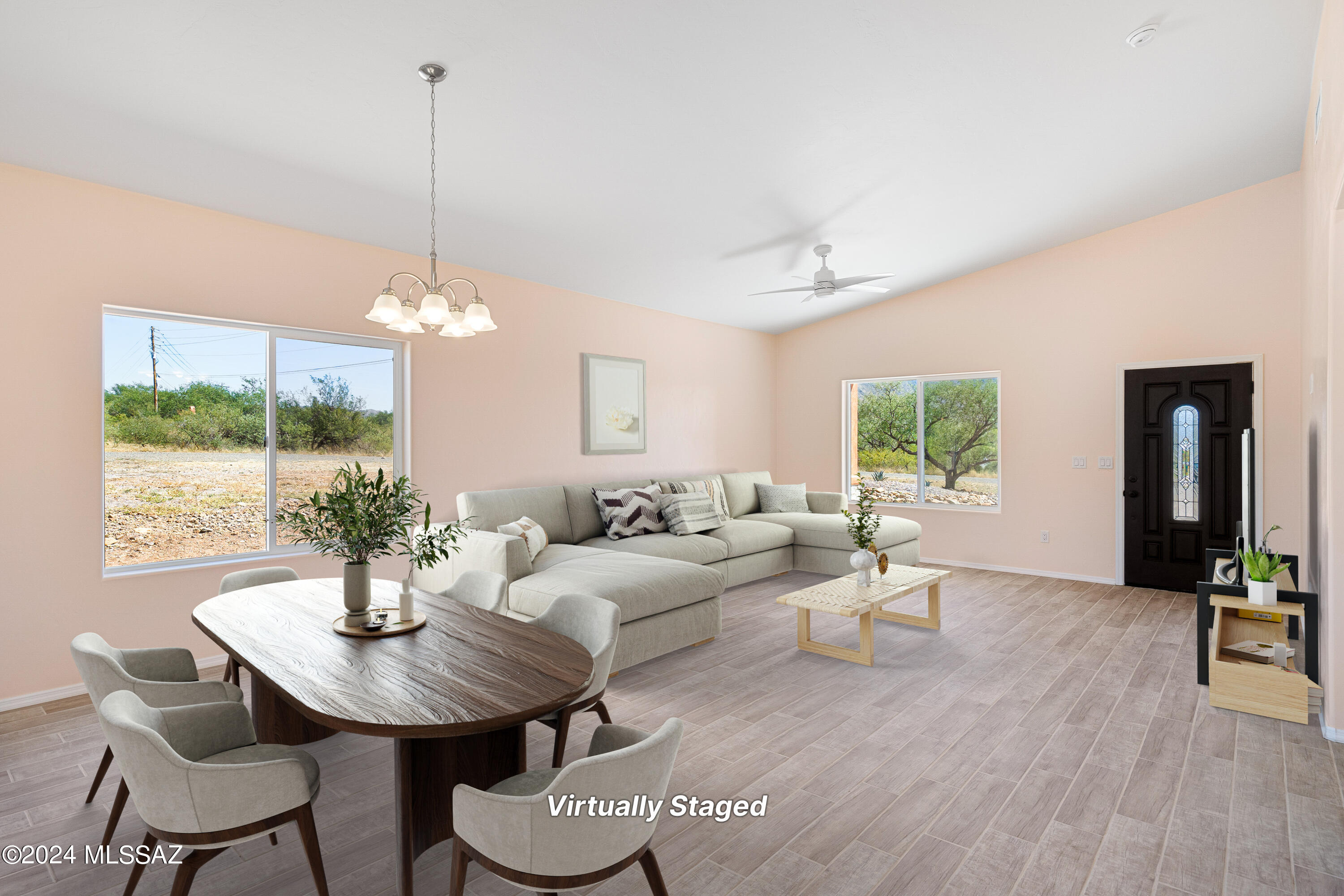 91 Avenida De Las Naciones Rio Rico, AZ 85648 - Photo 5 of 36 a living room with furniture chandelier and a table