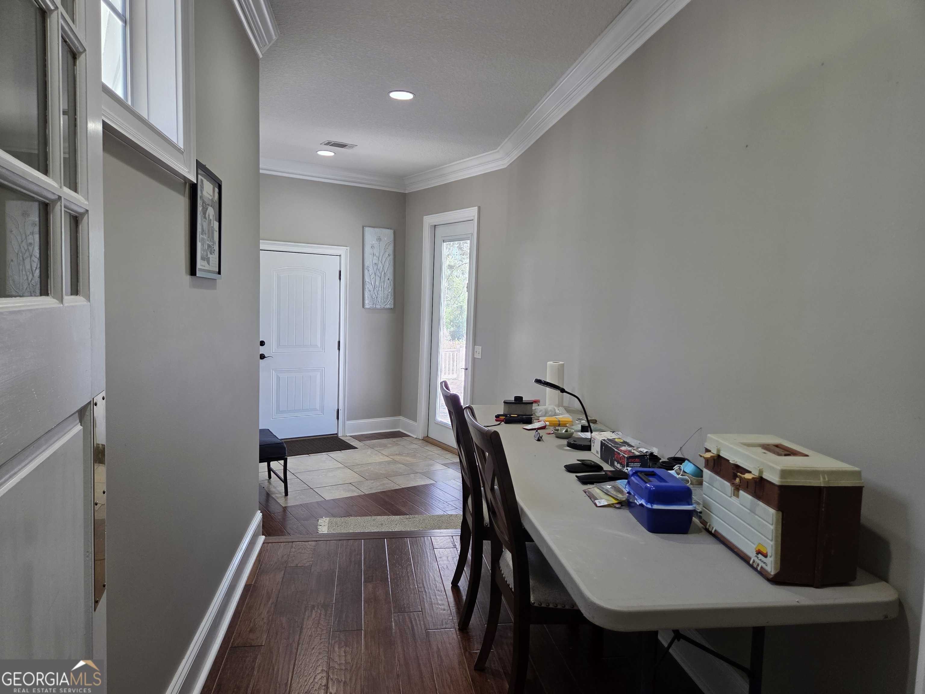 300 Hammond Powell Road Hazlehurst, GA 31539 - Photo 52 of 91 a view of a dining room with furniture and wooden floor