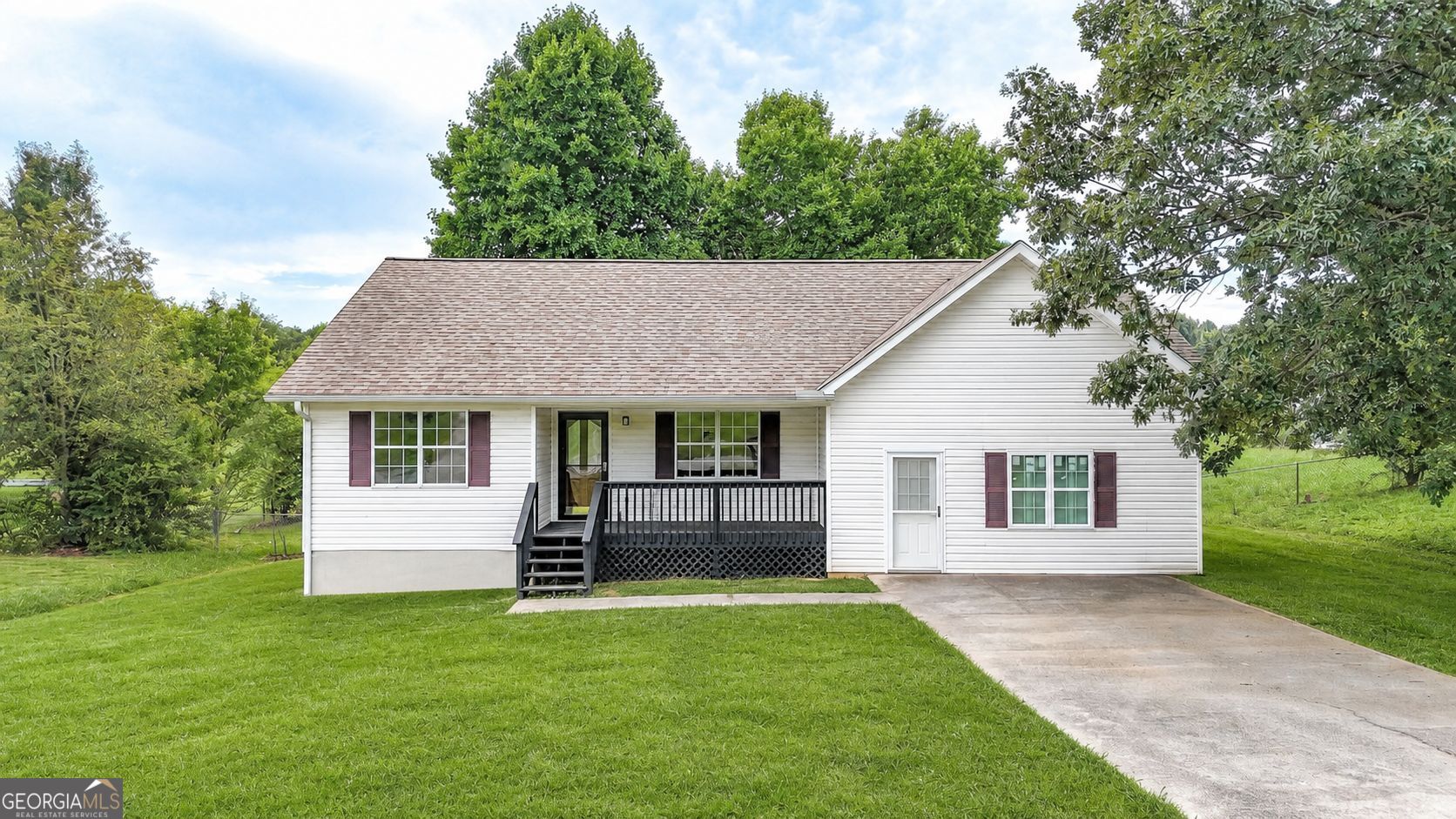 859 Buck Boulevard Southeast Calhoun, GA 30701 - Photo 1 of 1 Virtually enhanced grass to show the possibility