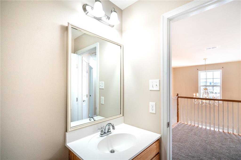 500 Walnut Drive McKees Rocks, PA 15136 - Photo 30 of 40 a bathroom with a sink and a mirror