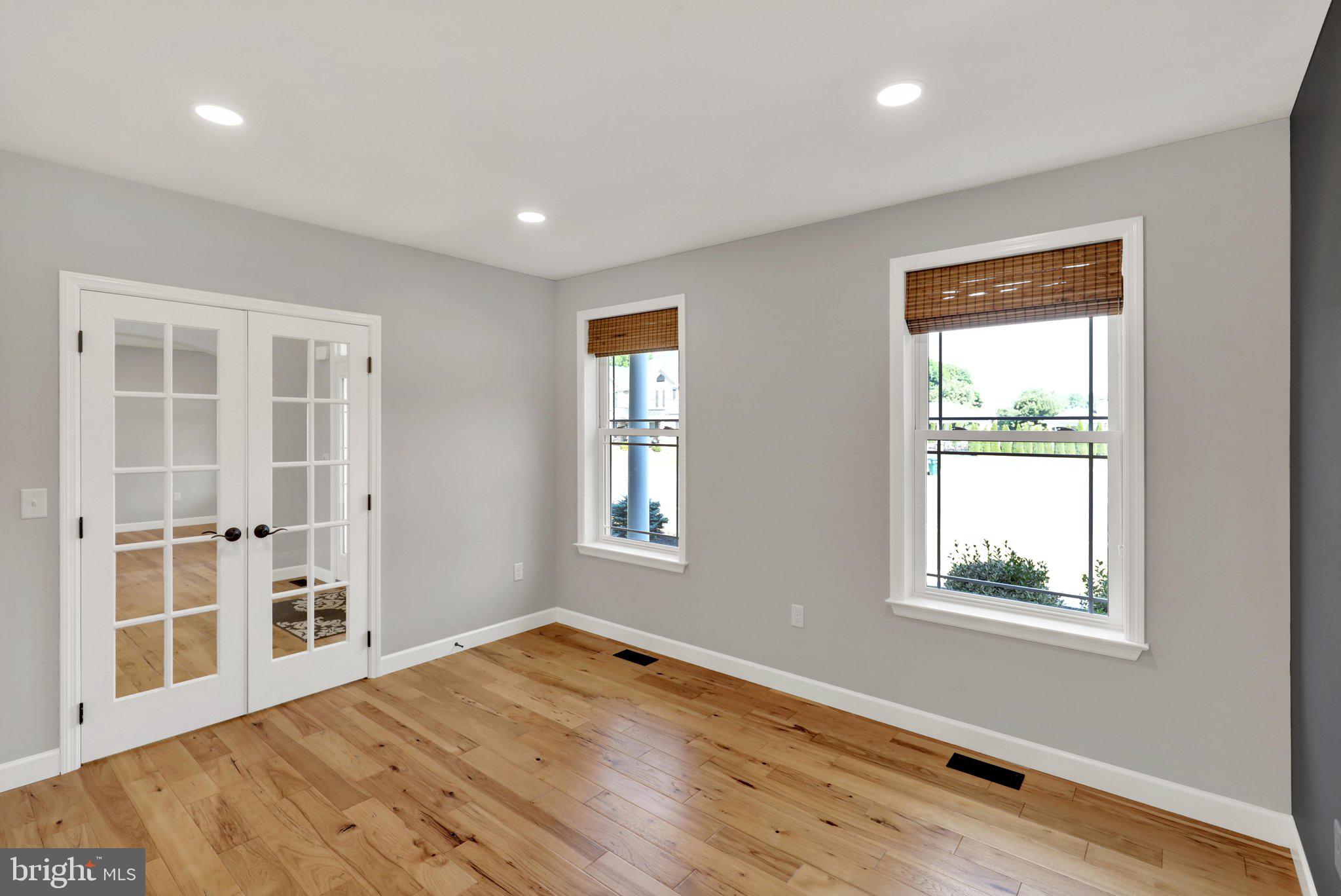 64 Middletown Road Fleetwood, PA 19522 - Photo 4 of 54 an empty room with wooden floor and windows