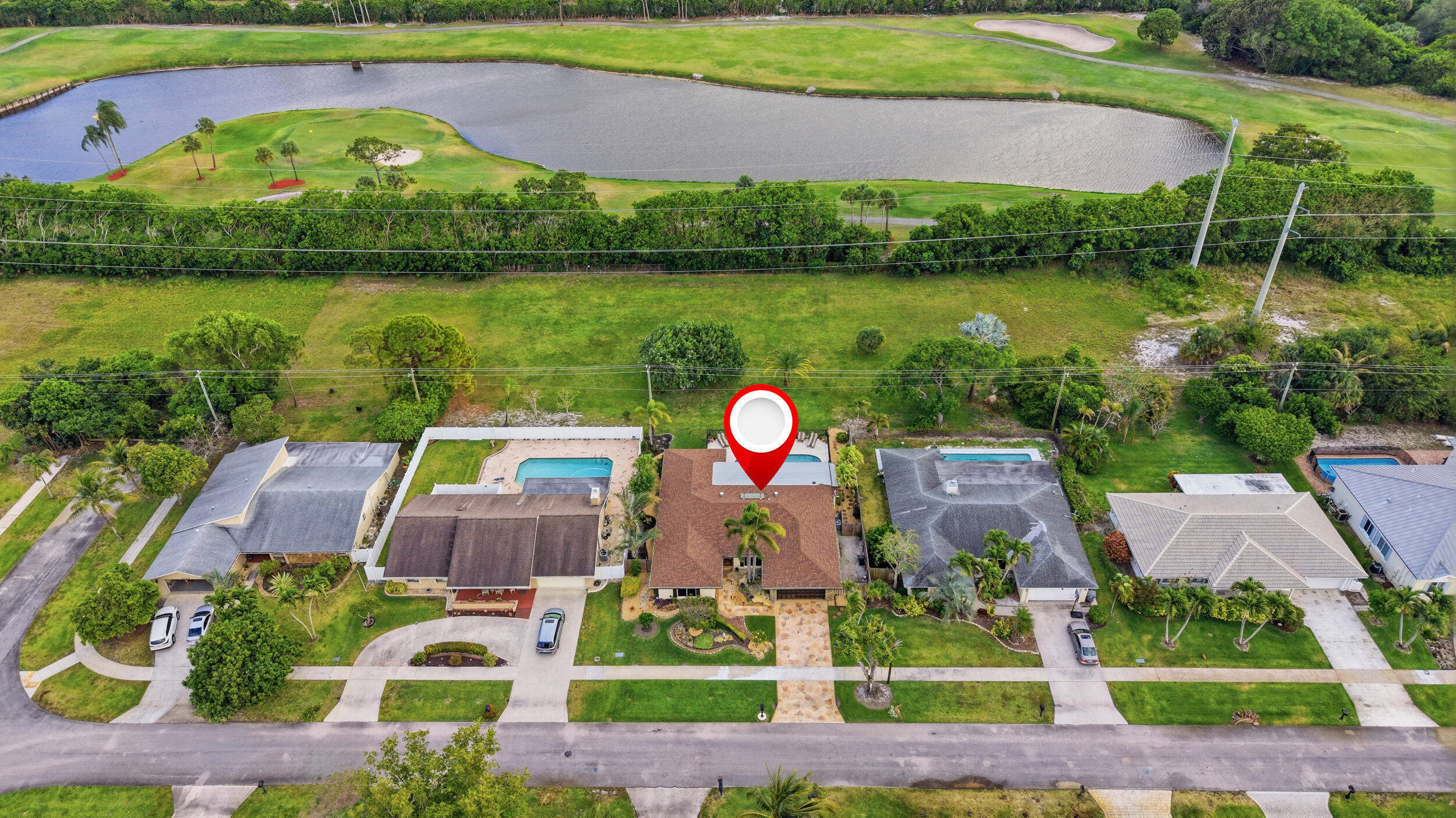 4780 Brandywine Drive Boca Raton, FL 33487 - Photo 4 of 43 an aerial view of house with yard swimming pool and outdoor seating