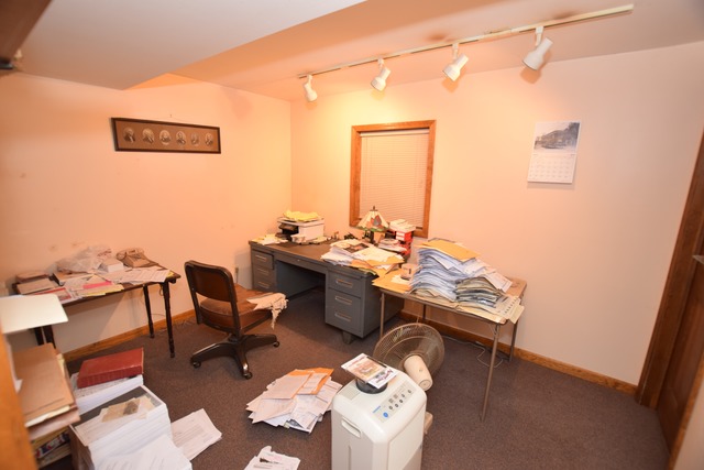 976 Lewis Road Geneva, IL 60134 - Photo 15 of 18 a view of a workspace with furniture and a table