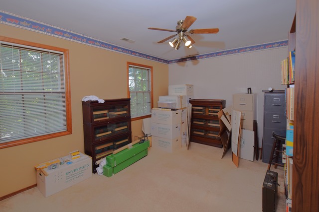 976 Lewis Road Geneva, IL 60134 - Photo 9 of 18 a view of workspace with furniture and windows