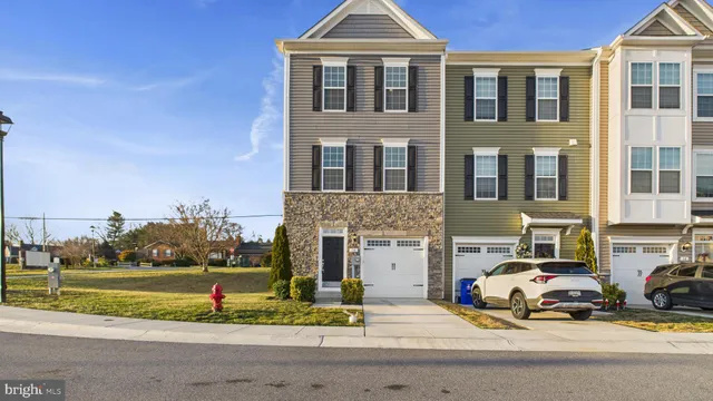 a view of a parked cars in front of a building