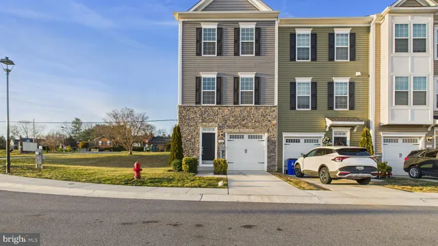 a front view of a building with garden