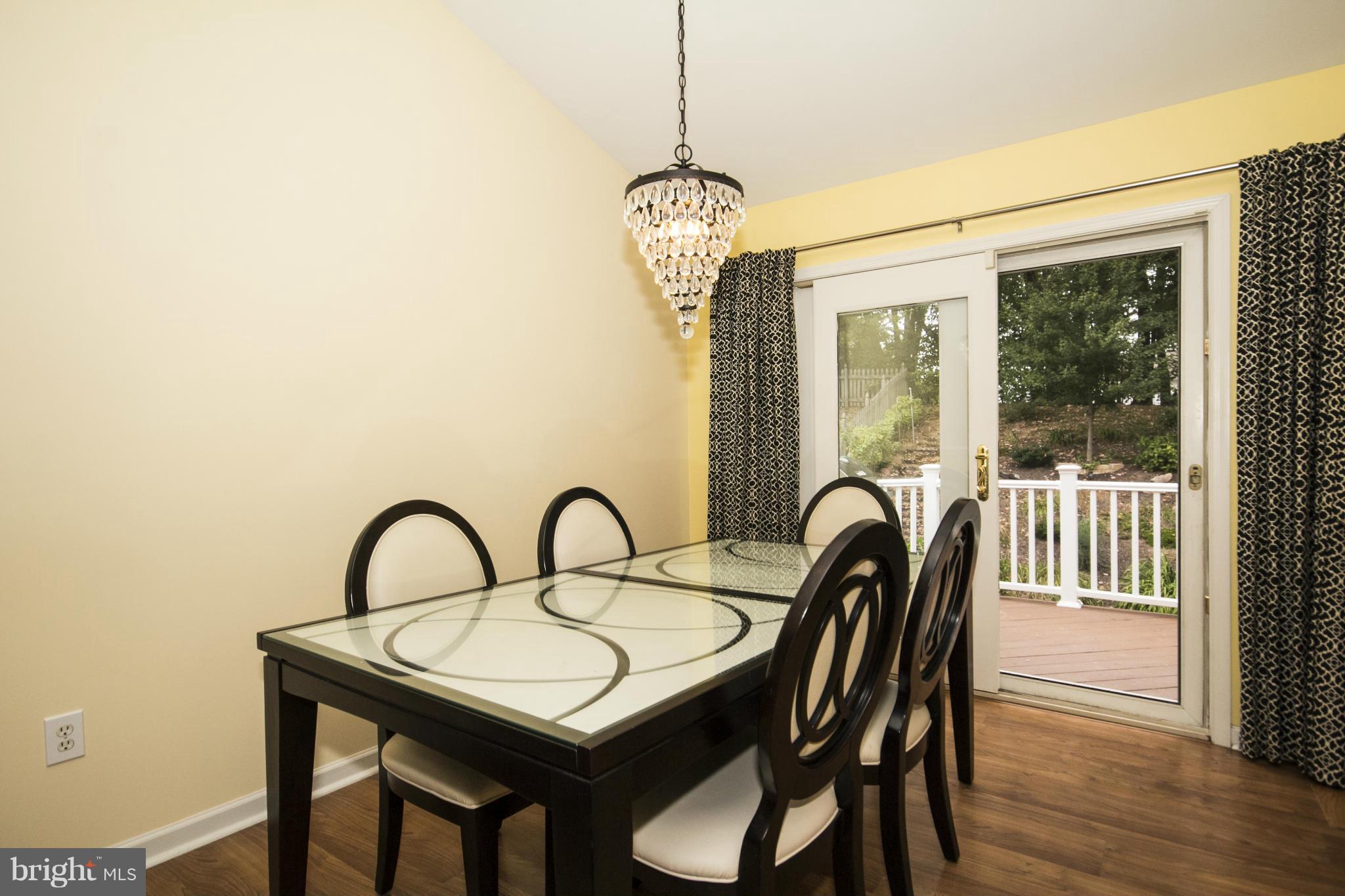 392 Enfield Road Joppa, MD 21085 - Photo 8 of 30 Dining Room With Sliders to Deck