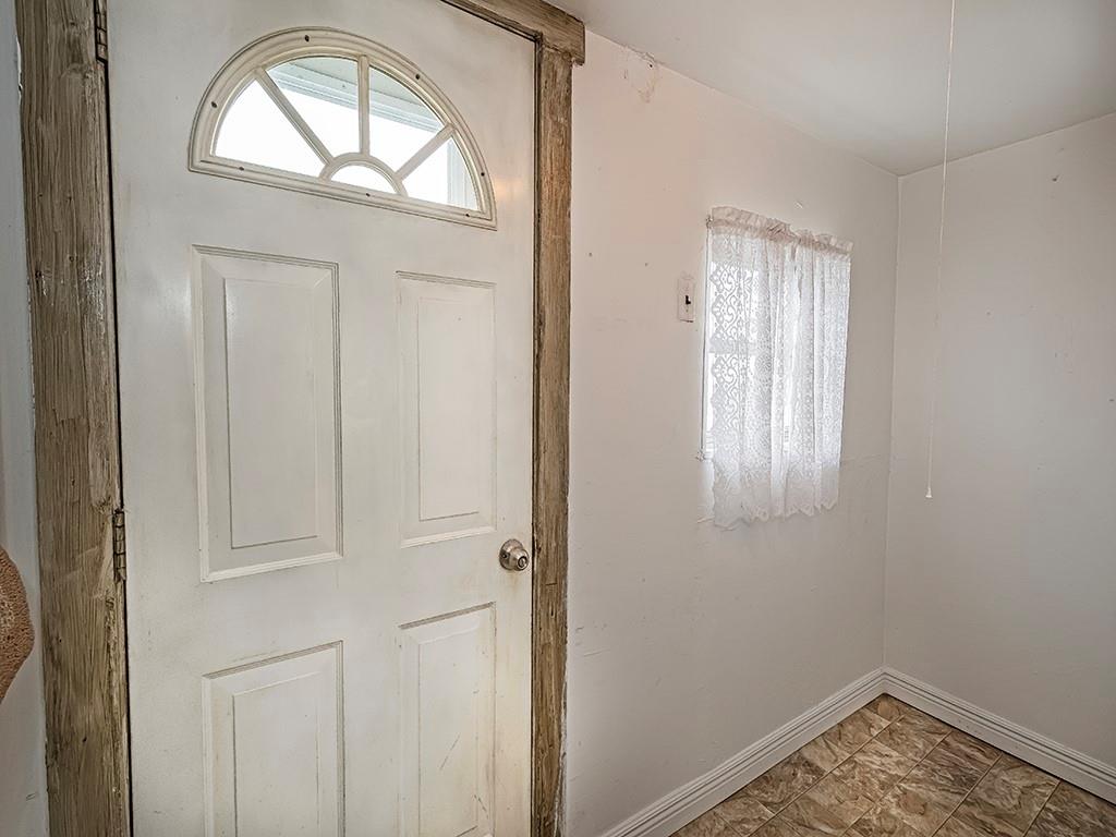 424 2nd Avenue Cadogan, PA 16212 - Photo 15 of 25 an empty room with wooden floor closet and windows