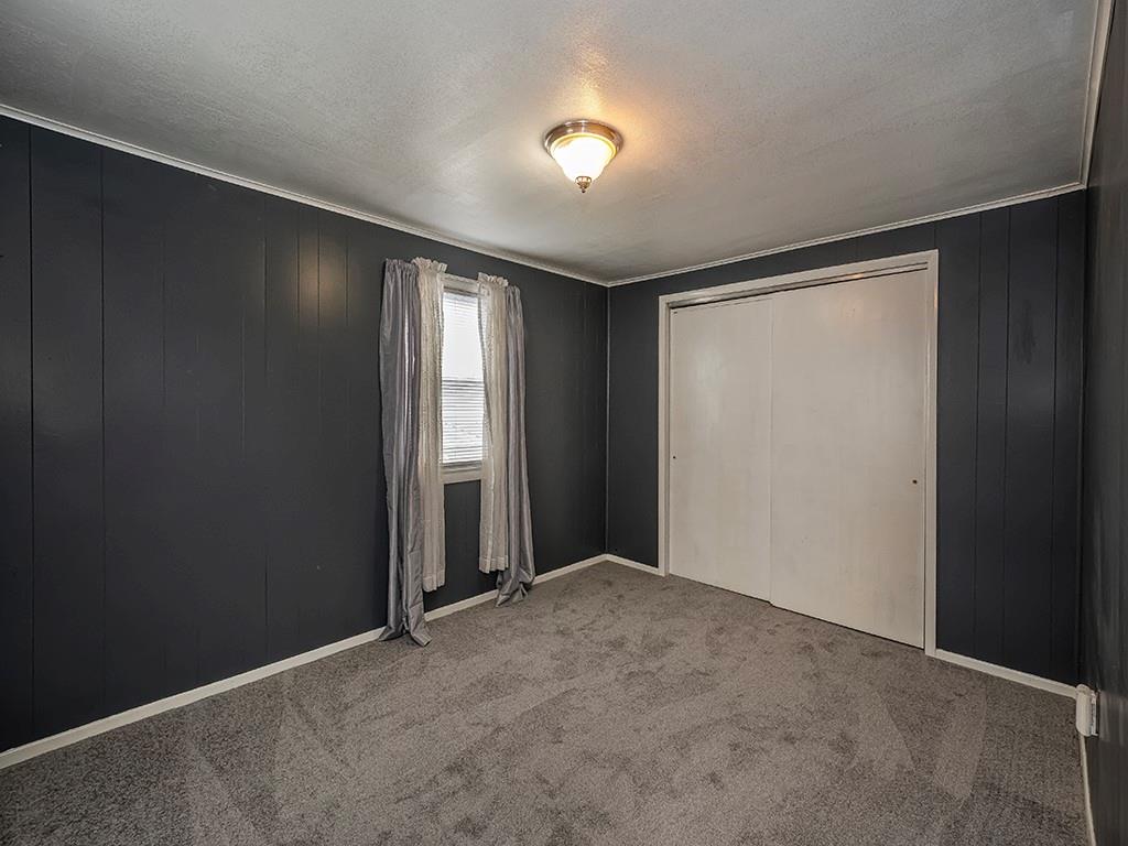 424 2nd Avenue Cadogan, PA 16212 - Photo 22 of 25 an empty room with windows and closet