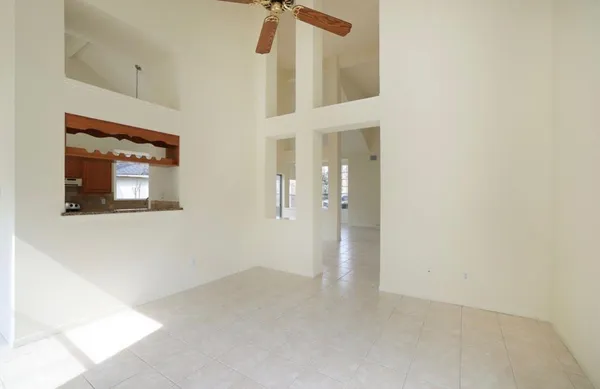 an empty room with a hallway