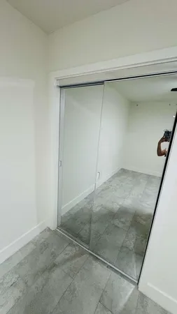 a bathroom with a sink and mirror