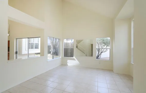 a view of an empty room and window