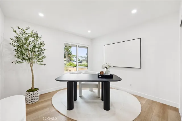a view of a room with a table and chair