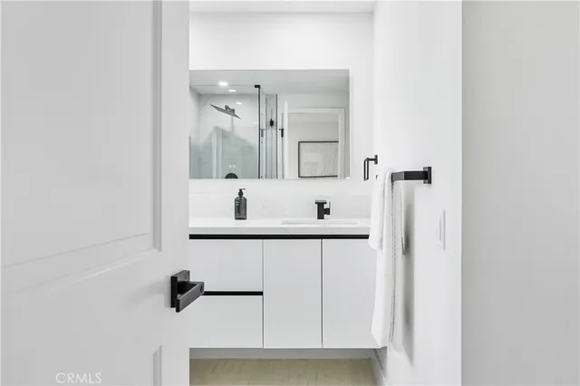 a bathroom with a bathtub and a sink