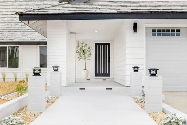 a bathroom with a bathtub and a sink