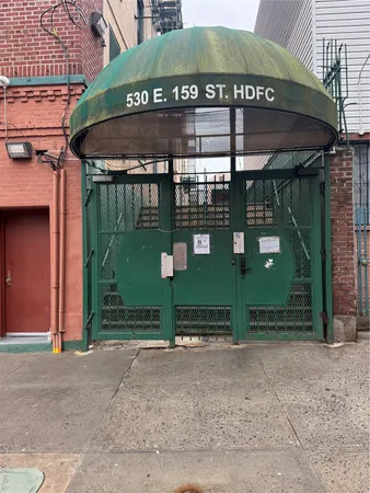 a view of a building with backyard