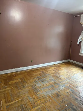 a view of a room with an empty space