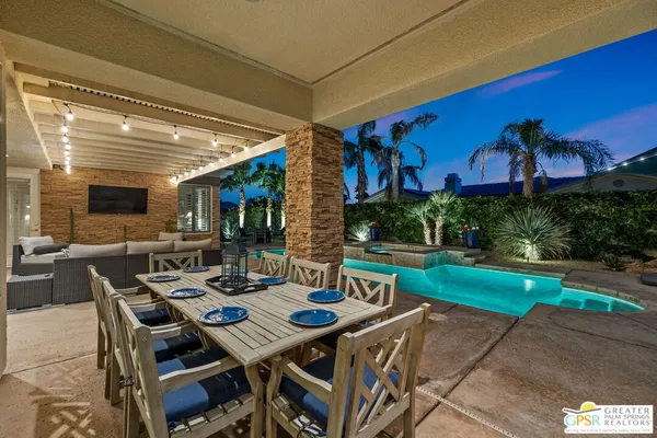 an aerial view of a house with swimming pool