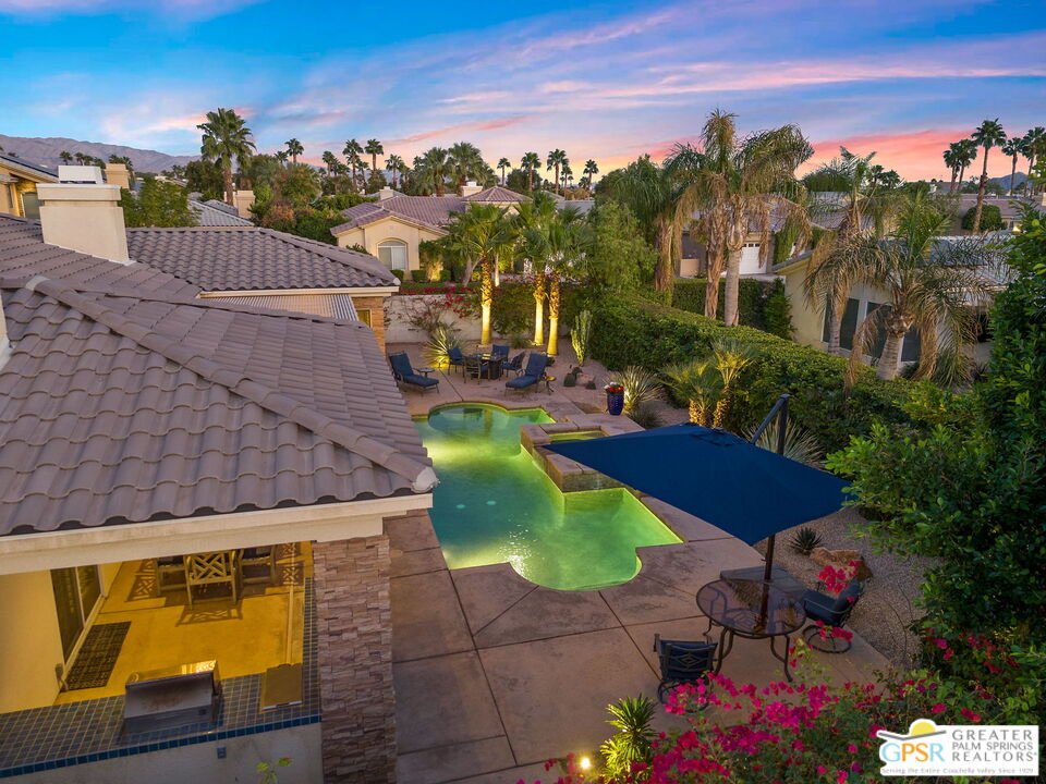 51 Killian Way Rancho Mirage, CA 92270 - Photo 15 of 71 a view of a swimming pool with an outdoor seating