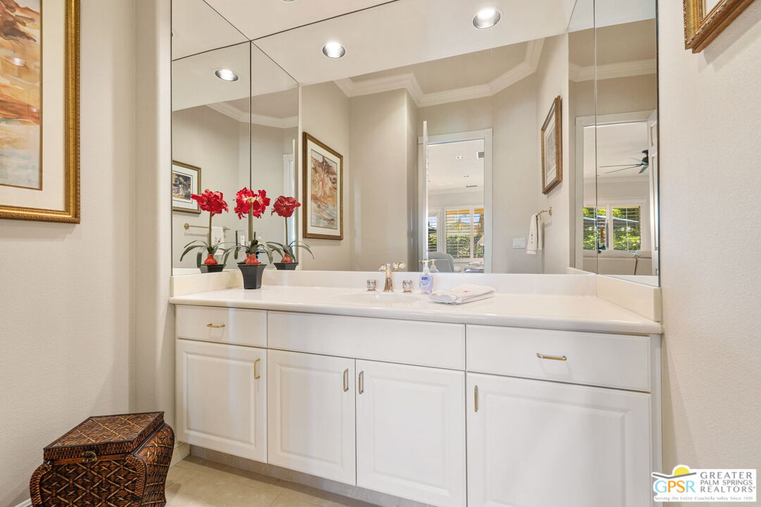 51 Killian Way Rancho Mirage, CA 92270 - Photo 31 of 71 a bathroom with a sink vanity and a mirror