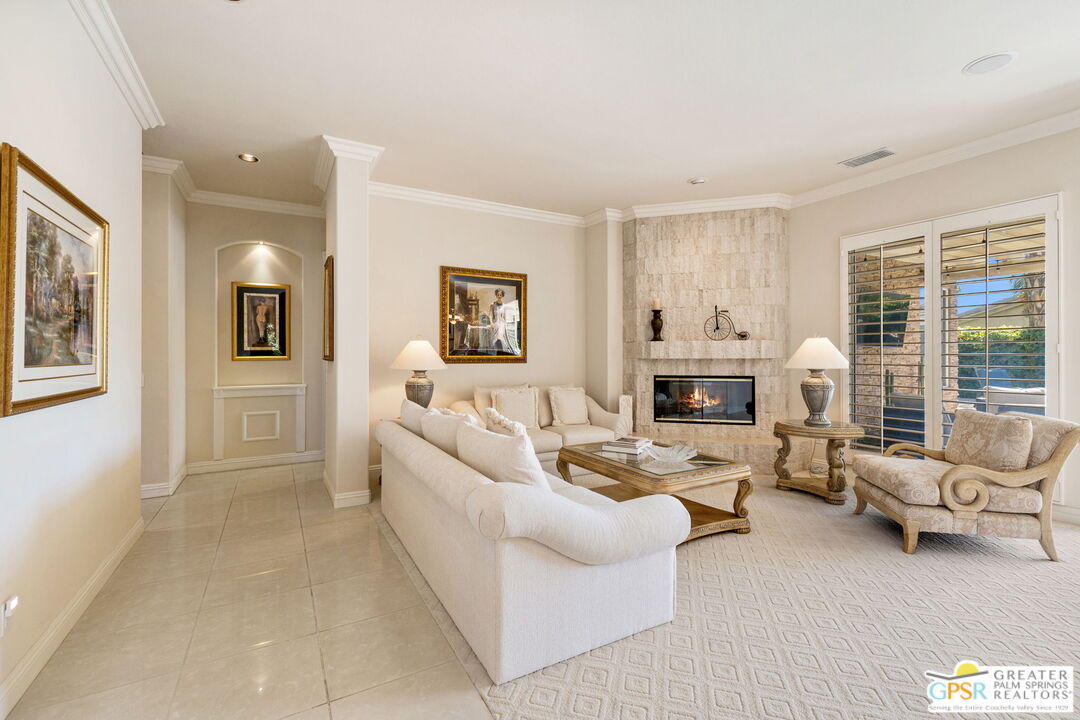 51 Killian Way Rancho Mirage, CA 92270 - Photo 39 of 71 a living room with furniture and a fireplace