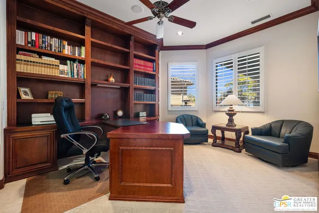 a view of a balcony with chair and glass door