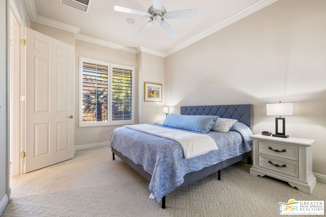51 Killian Way Rancho Mirage, CA 92270 - Photo 50 of 71 a bedroom with a bed and a dresser
