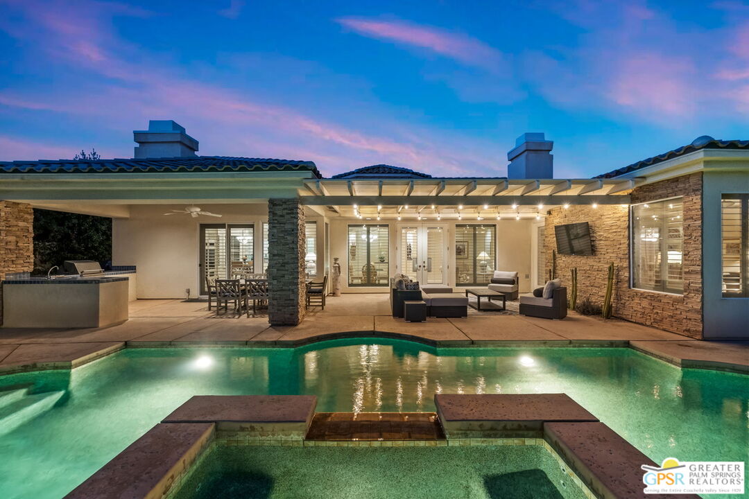 51 Killian Way Rancho Mirage, CA 92270 - Photo 7 of 71 a view of a swimming pool with seating space
