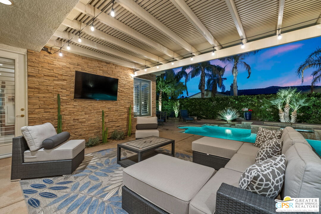 51 Killian Way Rancho Mirage, CA 92270 - Photo 9 of 71 a outdoor living space with furniture and a flat screen tv