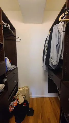 a view of a hallway with washer and dryer