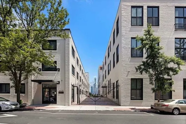 a view of parking garage with cars